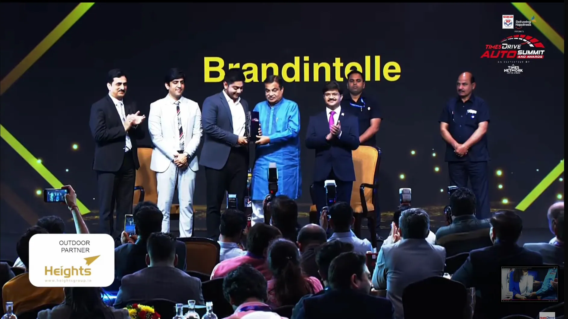 Brandintellé team receiving an industry award on stage
